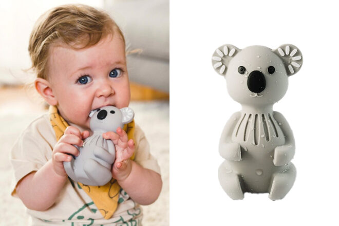 young child chewing on the ear of a Calma Koala teething toy