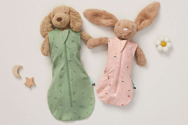 ergoPouch matching sleeping bags for dolls showing the soft colours and patterns whilst worn by two stuffed toy animals