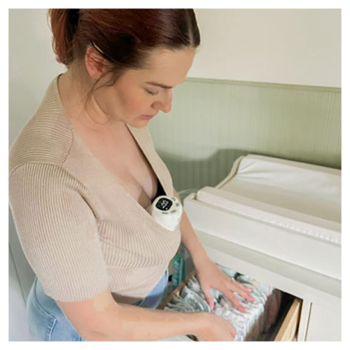 Mum using the Welcare Nurture Wearable Electric Breast Pump while doing chores