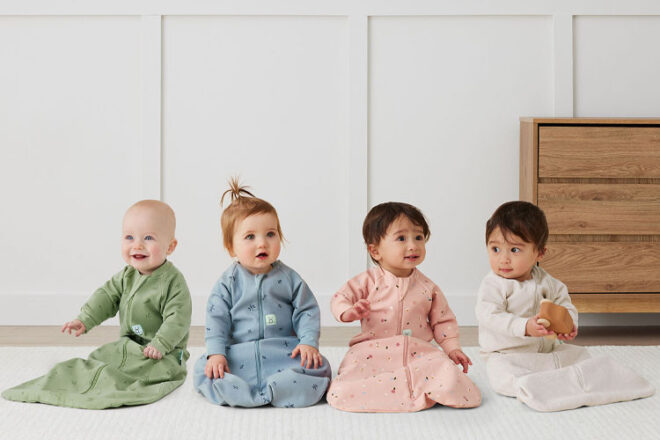 For babies wearing the ergoPouch 2023 Heritage collection sitting on the floor
