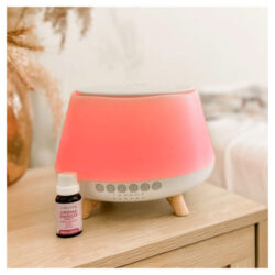 Lively Living Aroma Snooze Plus in use lit up next to essential oil