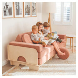 Three children sitting on the My NooK Play couch
