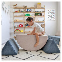 Child sitting on the My NooK Junior play couch