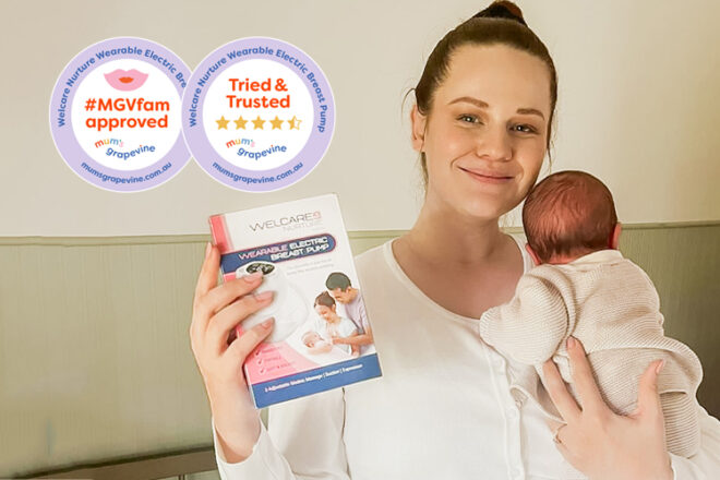 Mother holding a baby on shoulder with box of Welcare breast pump