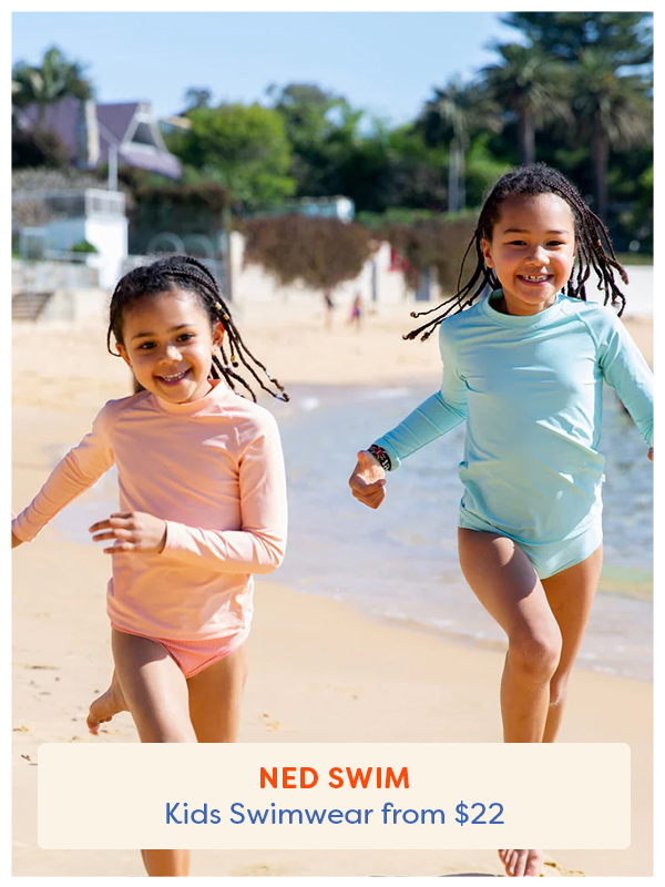 two girls running down the beach wearing Neds swimwear rashies and bather bottoms