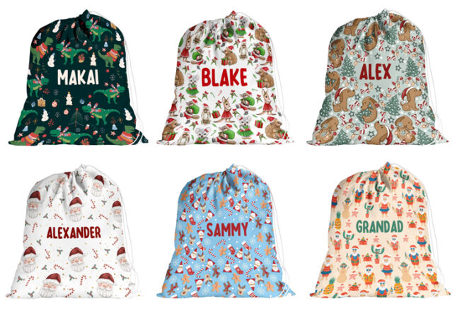 A collection of Santa Sacks with different designs and customed with names