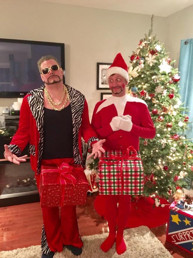 Dad dresses as elf on the shelf next to Justin Timberlake dress up with empty boxes