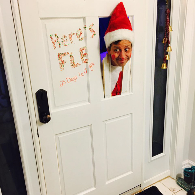 Dad dresses as elf on the shelf pretending to be from the shining movie