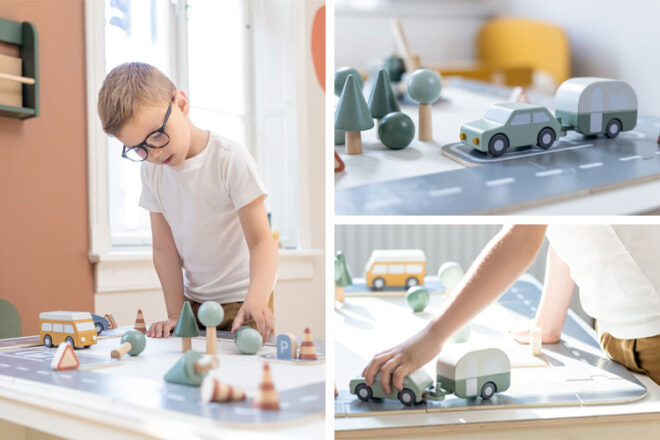 Child playing with the FLEXA car track and accessories