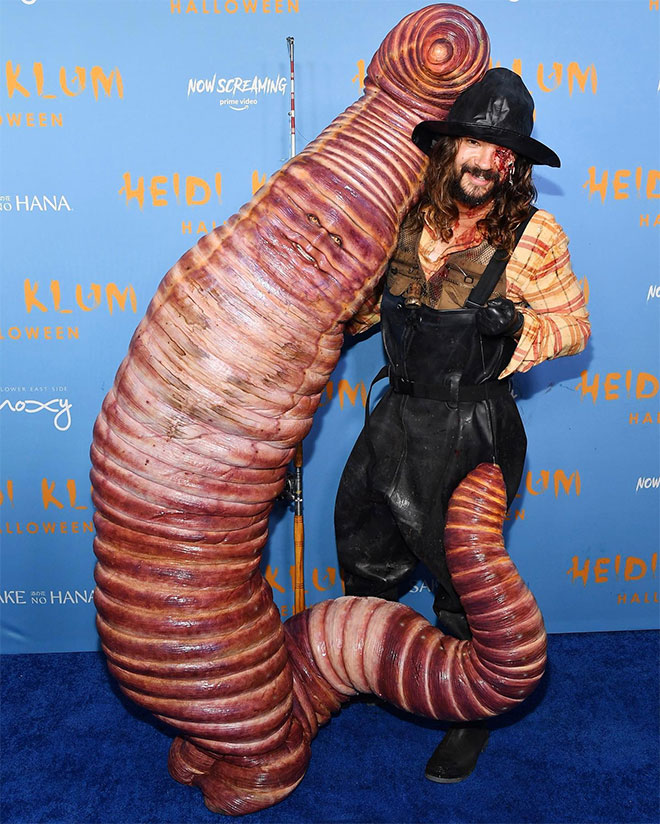 Heidi Klum and her husband Tom Kaulitz dressed as a worm and fisherman for Halloween 2022