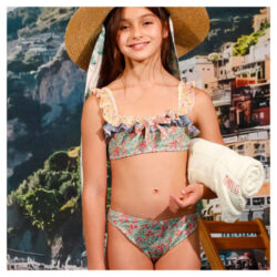 girl in straw sun hat wearing Marlo kids floral bikinis