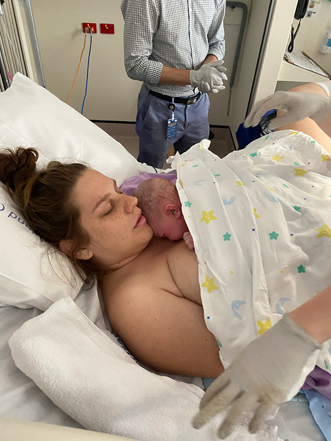 Mother with her newborn doing skin to skin contact straight after birth
