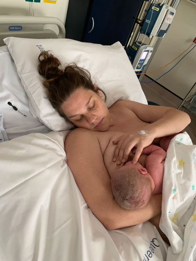 Wandah breastfeeding newborn Daisy