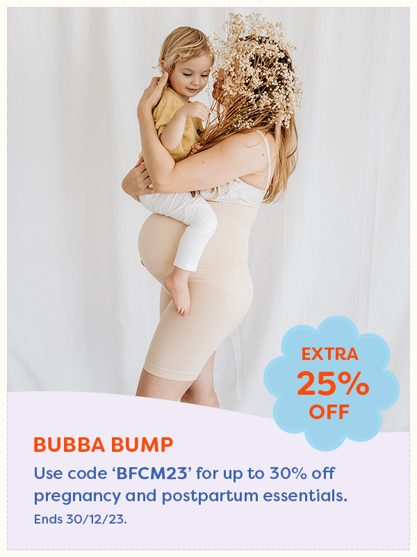 A mother holding a child wearing Bubba Bump