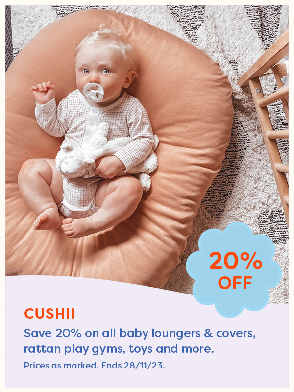 A baby laying in the Cushii lounger
