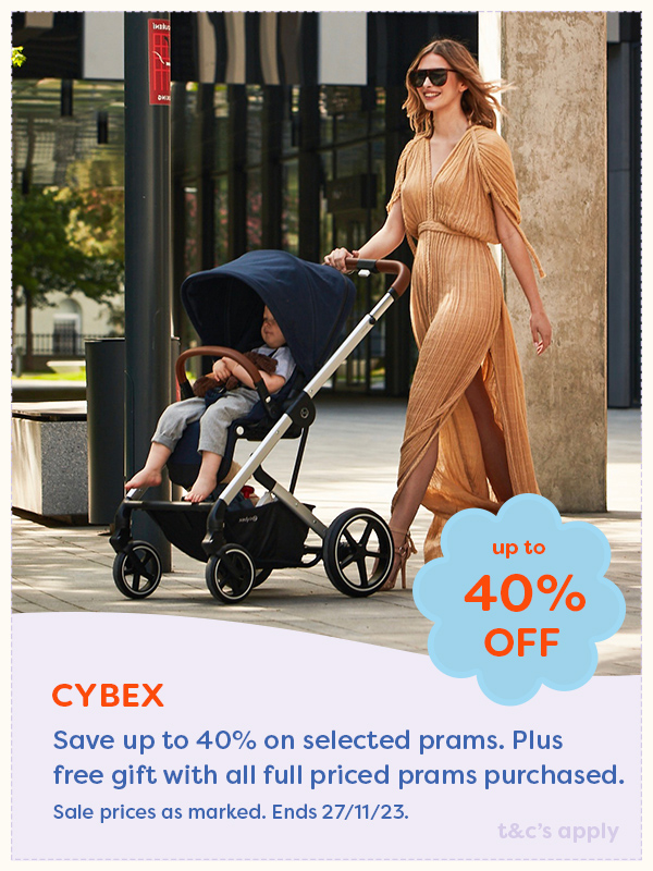 Young mother pushing a toddler in a Cybex pram