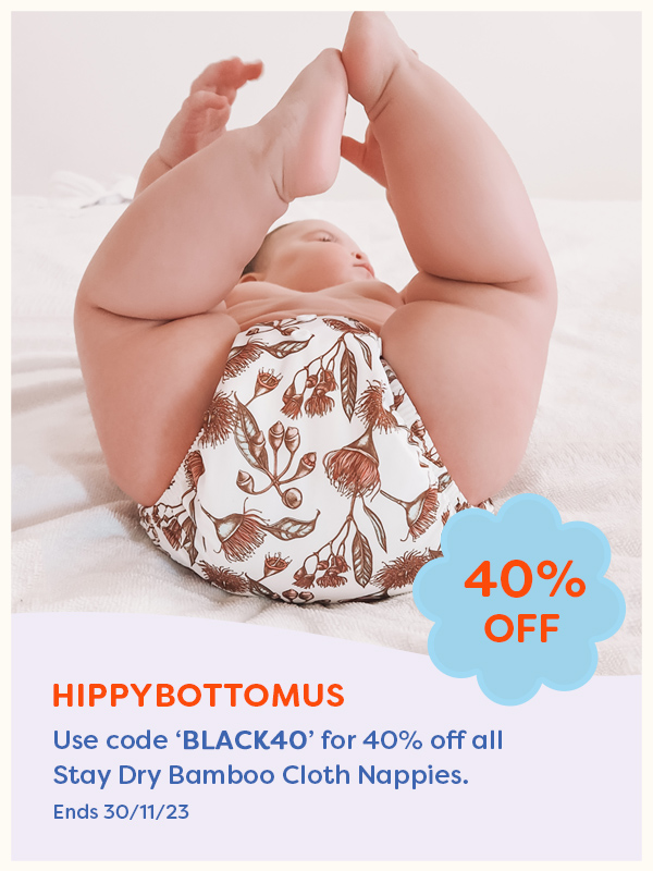 A baby wearing a Hippybottomus cloth nappy