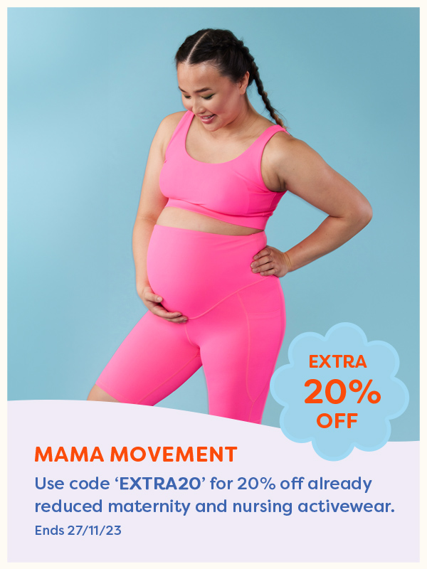 A pregnant woman wearing Mama Movement maternity activewear