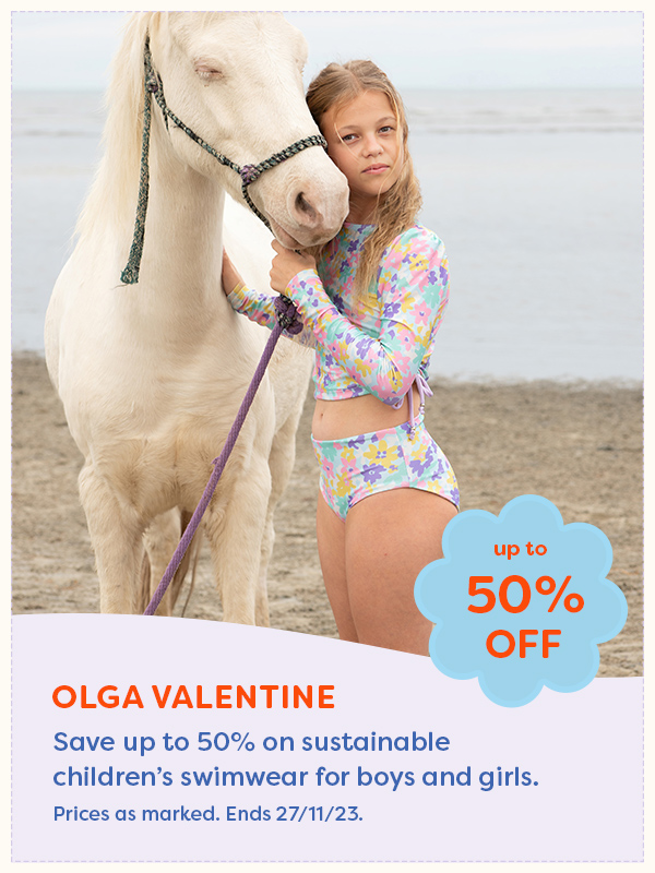 A girl wearing Olga Valentine swimwear next to a horse