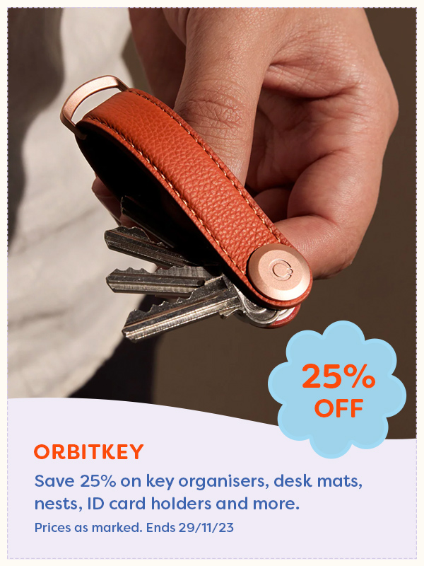 Man holding an open Orbitkey key chain