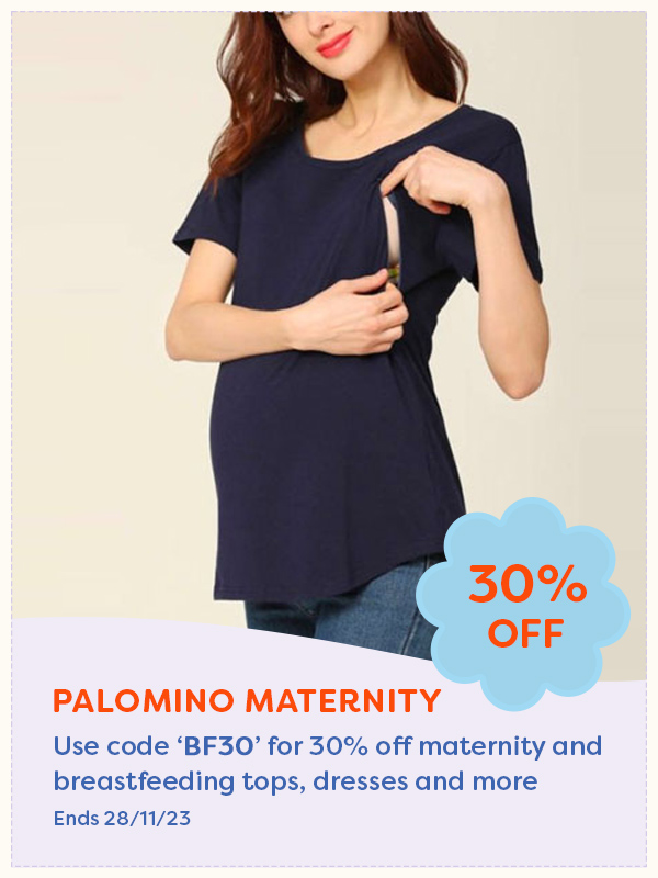 A woman wearing a Palomino Maternity nursing tshirt