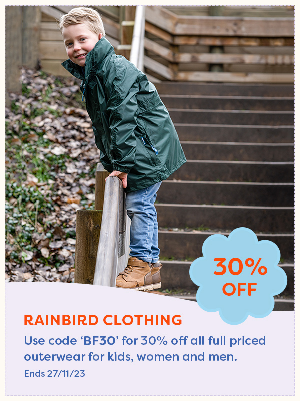 A child wearing a Rainbird rain jacket