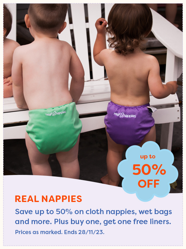Two babies wearing Real Nappies cloth nappies