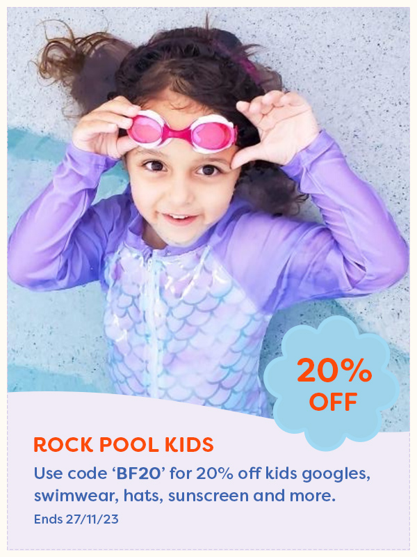 Girl wearing pink goggles from Rock Pool Kids in a kiddy pool