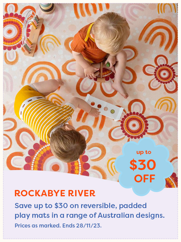 Two babies playing on a Rockabye River Padded Play Mat