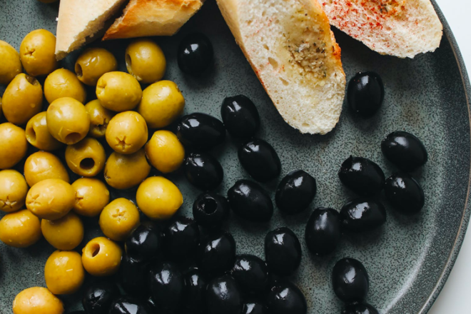 Plate of green and black olives