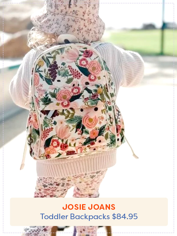 Toddler on a scooter wearing a Josie Joans backpack