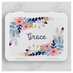 Tinyme Bento Box with the name Grace on the front on a marble background