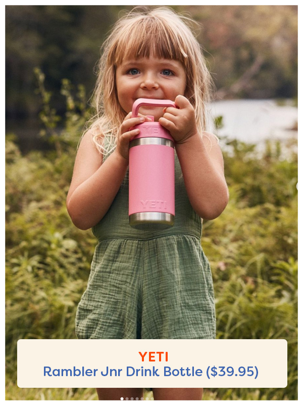 Young girl drinking from a Yeti water bottle