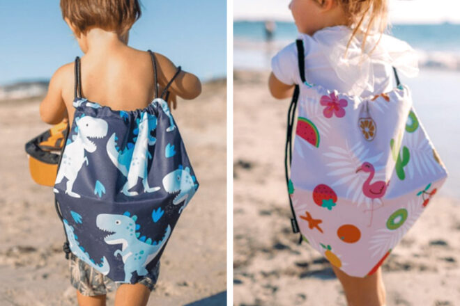 Two toddlers wearing Newlyfe swim bags at the beach