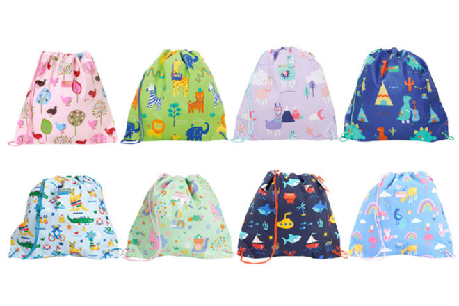 Two rows of Penny Scallan Drawstring Bags in a variety of colours and designs