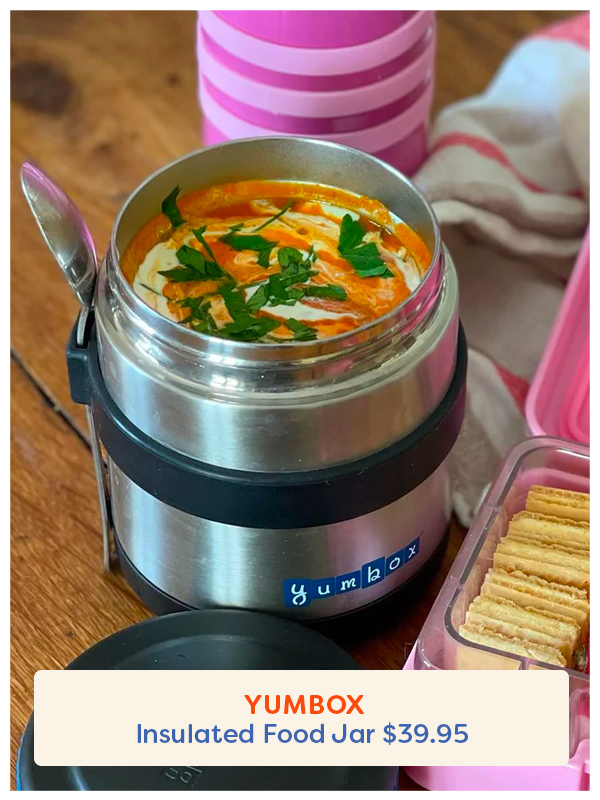 Insulated food jar on a table full o fpiping hot soup