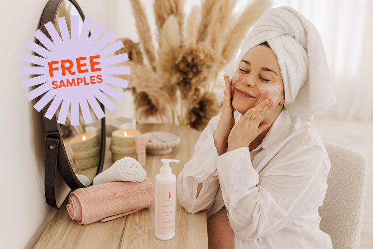 Woman rubbing Bheue Skincare into her face with text 'free samples' in a callout bubble