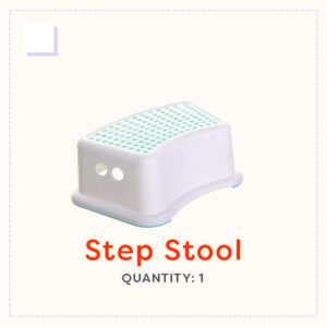 White step stool with green non-slip dots
