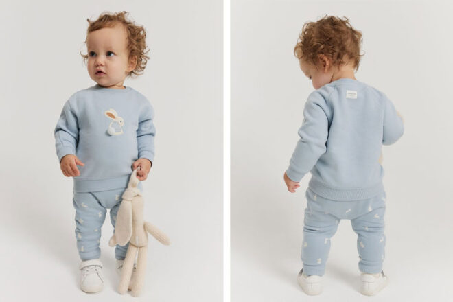A baby wearing the Country Road Cotton Bunny Sweatsuit