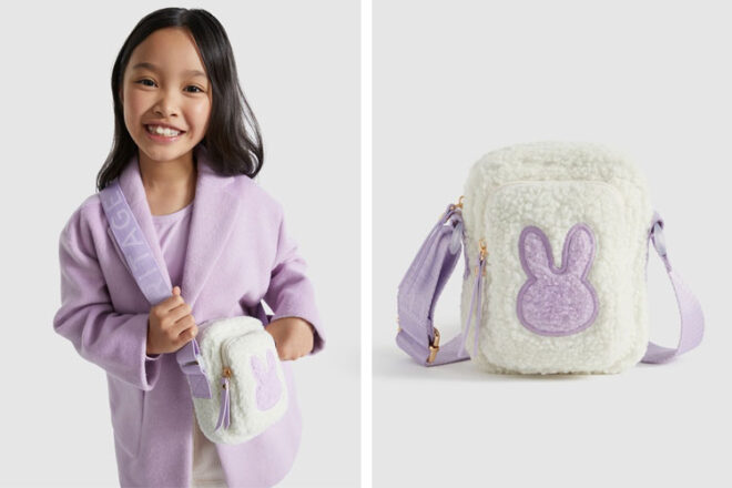 A young girl wearing the Seed Heritage Teddy Bunny Crossbody bag