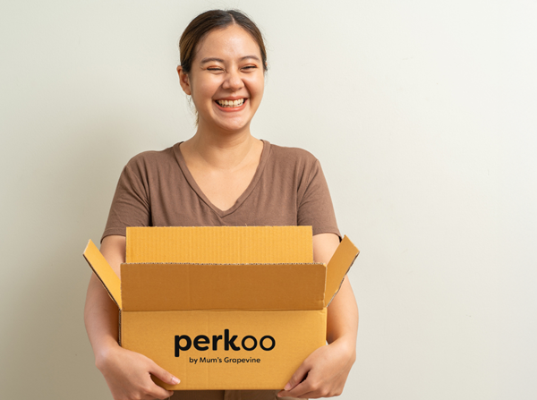 Mother Holding Perkoo Box with product Review samples