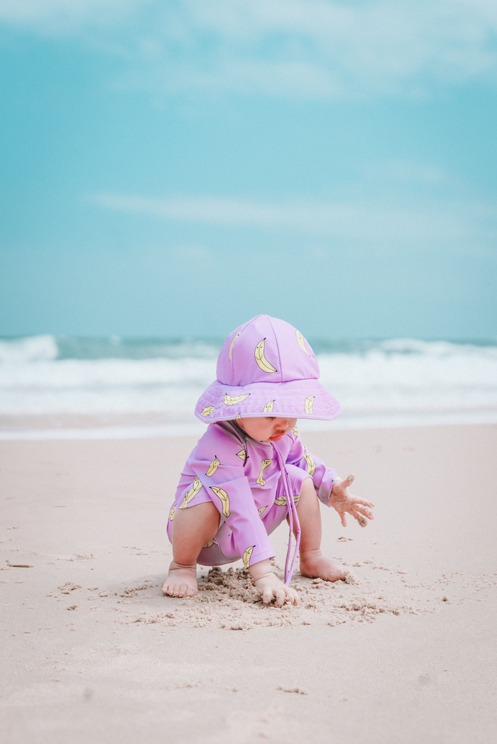young toddler at the beach si