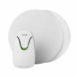 Breathing movement sensor pad placed under a cot mattress