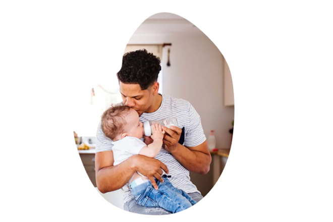 dad bottle feeding baby fi